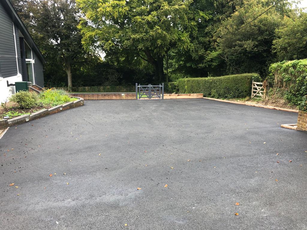 This is a photo of a bitumen driveway which is in the process of being installed by Tenterfield Asphalt & Bitumen Surfacing